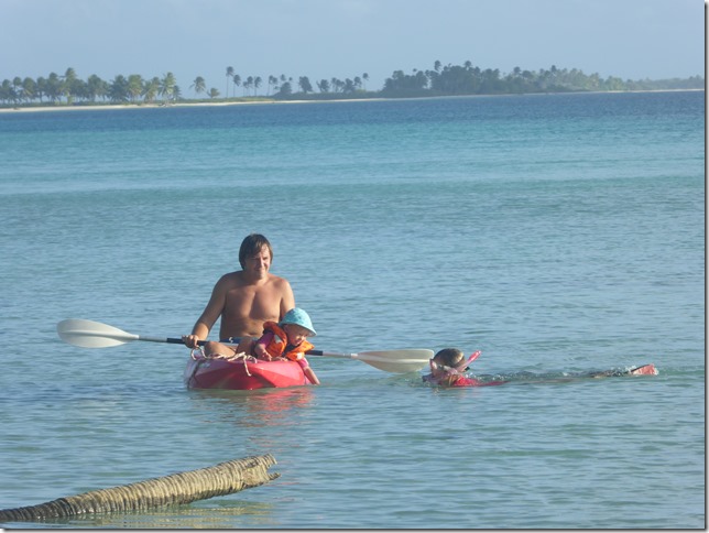 Georg and Mia on the kayak with their propellor, Hannah